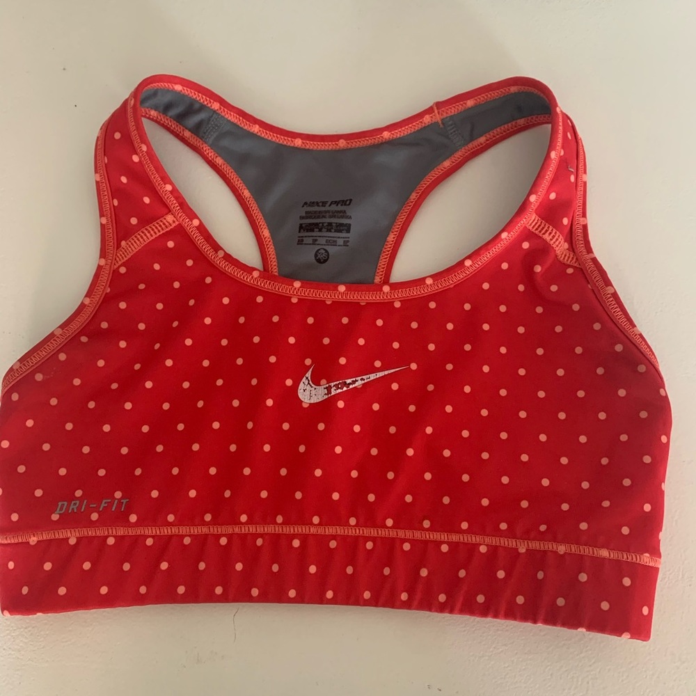 Red polka dot Nike sports bra
